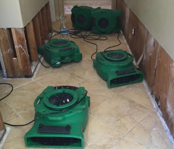 Drying equipment in hallway.