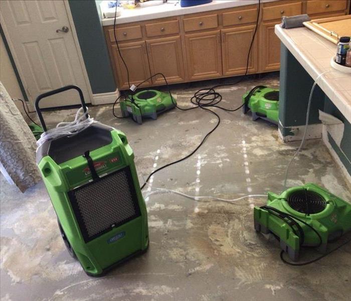 Drying equipment running in a bathroom.