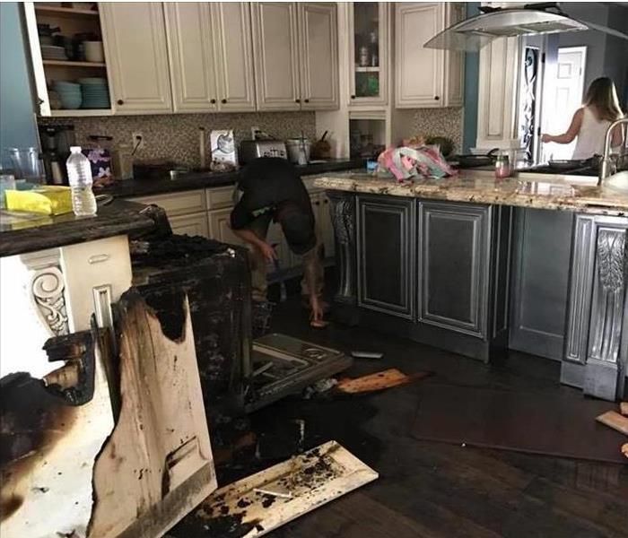 Kitchen fire damage is being restored by a specialist